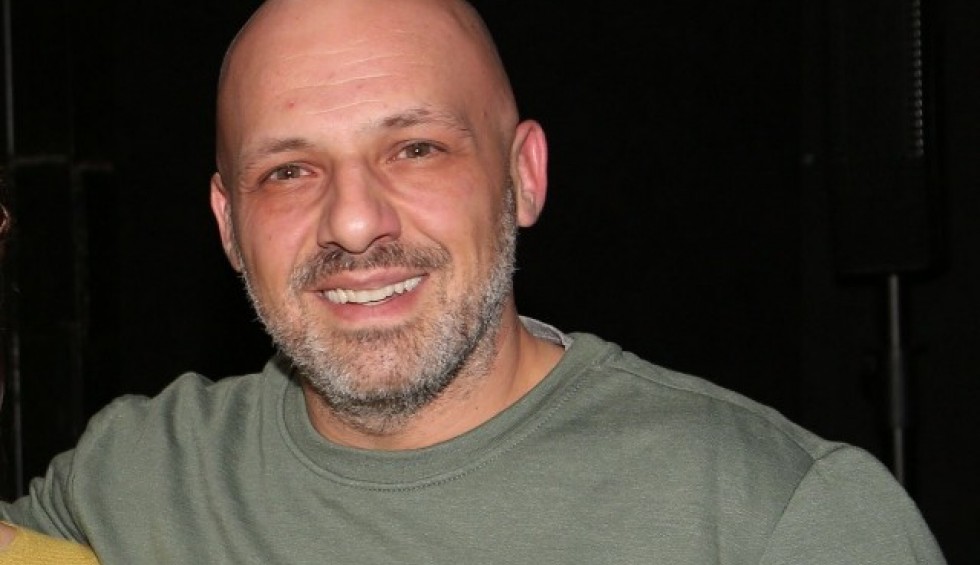 A generic square placeholder image with rounded corners in a figure.