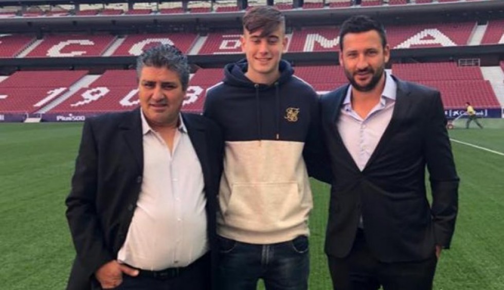 A generic square placeholder image with rounded corners in a figure.