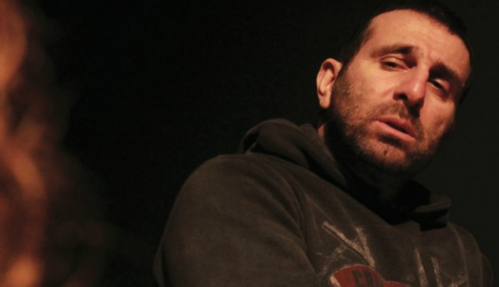 A generic square placeholder image with rounded corners in a figure.