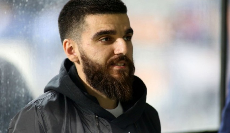 A generic square placeholder image with rounded corners in a figure.