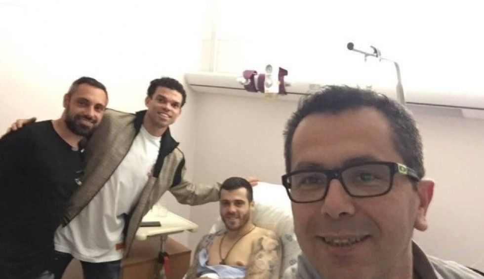 A generic square placeholder image with rounded corners in a figure.