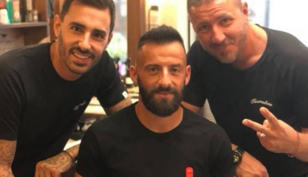 A generic square placeholder image with rounded corners in a figure.